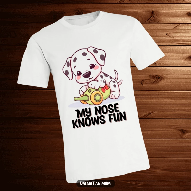 Funny Kawaii Dalmatian T-shirt, featuring a cute dog playfully nudging a rolling toy with its nose, showcasing pure puppy fun.